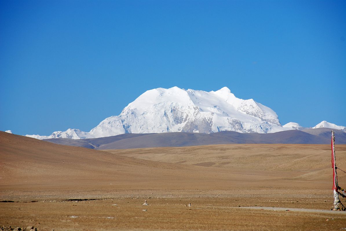 02 Gang Benchen From Between Friendship Highway And Shishapangma Checkpoint The large mountain to the north west of Shishapangma is Gang Benchen with heights variously given as 7281m, 7295m or 7299m.